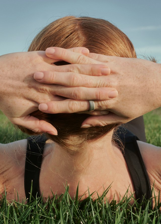 Relaxing outdoors while wearing Oura Ring 5