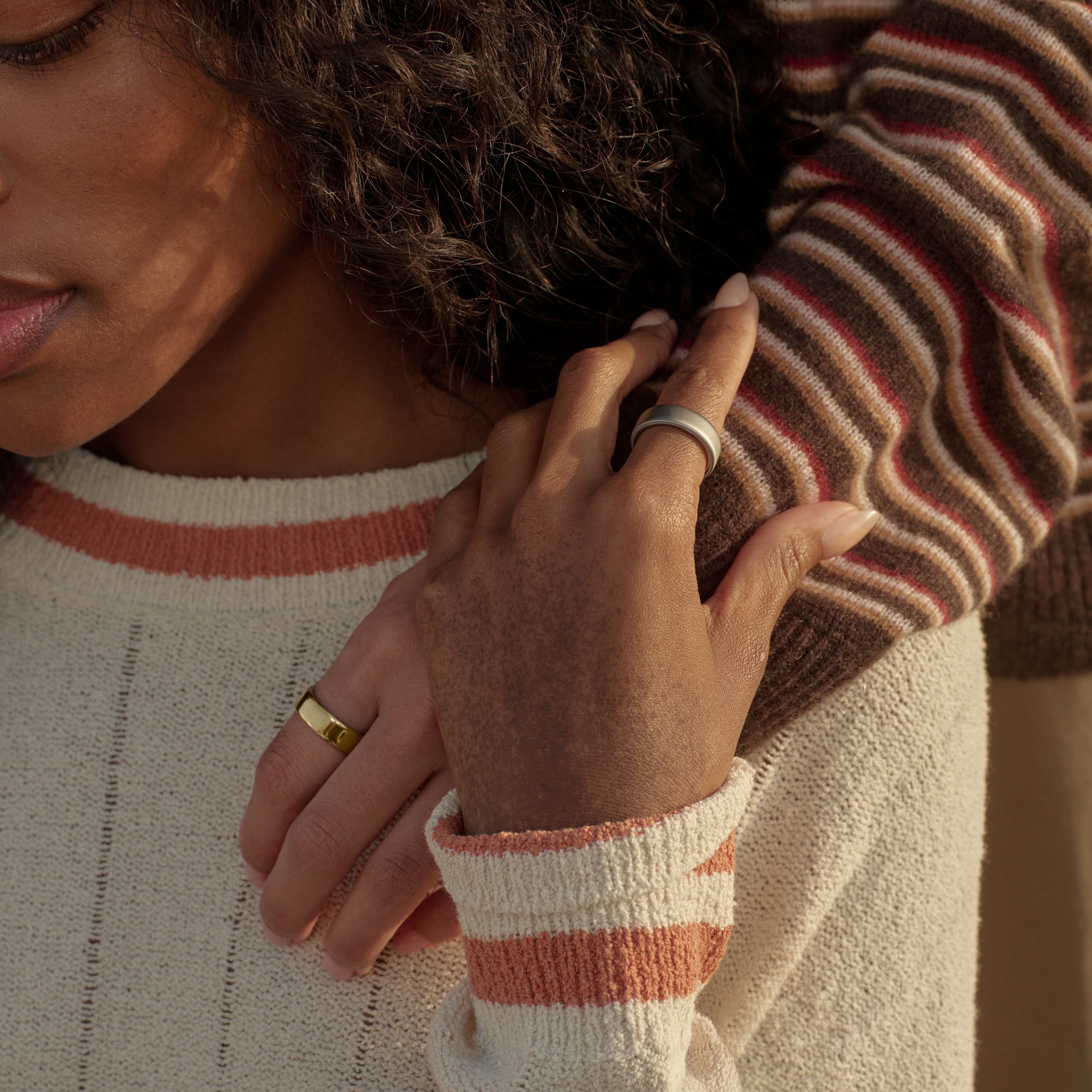 Oura Ring 5 worn on a hand