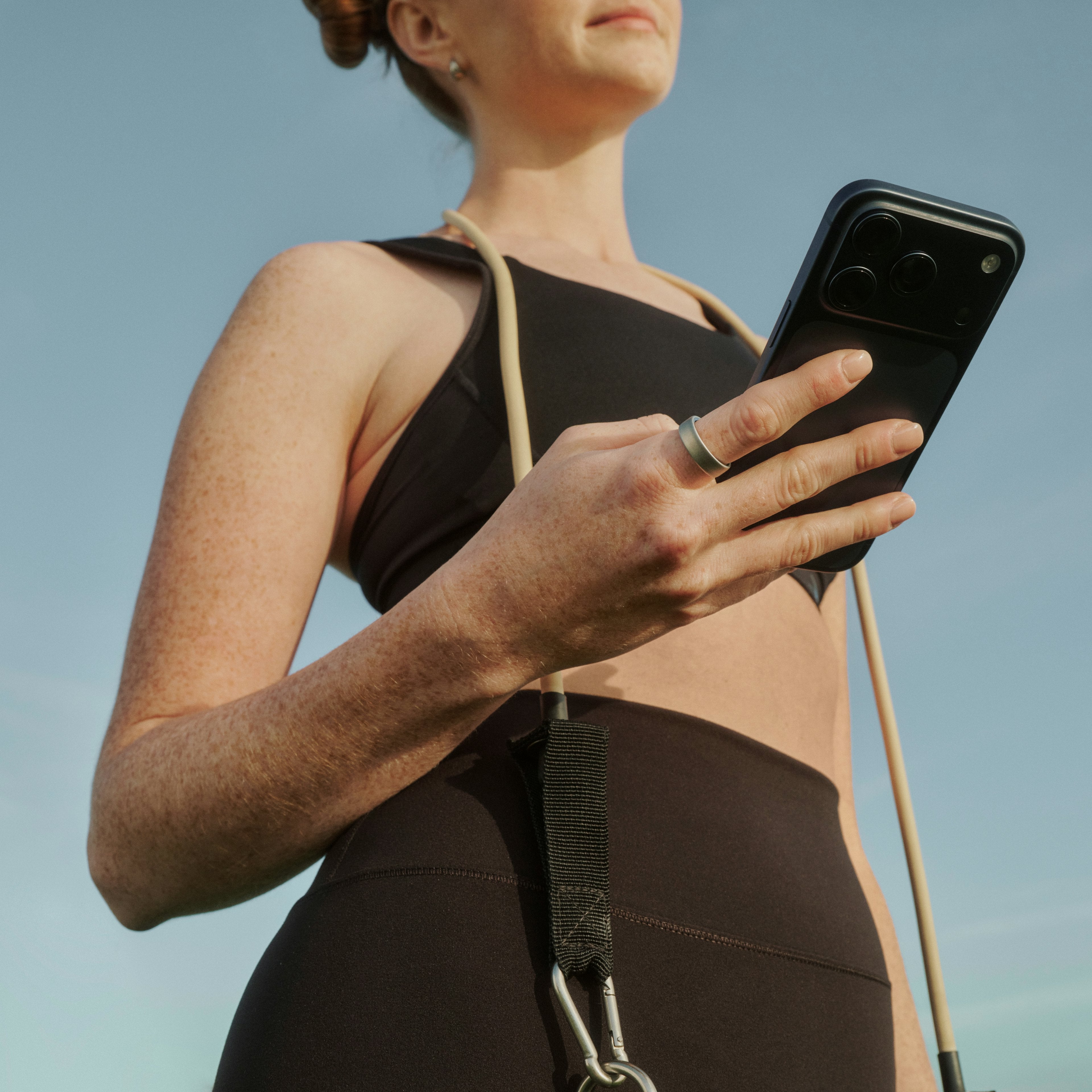 Viewing a smartphone while wearing Oura Ring 5